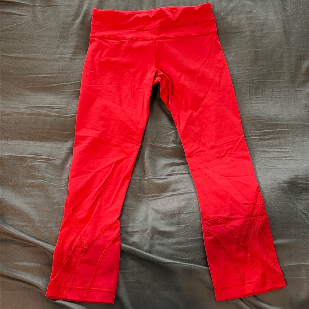 Excellent condition, red Lululemon leggings. Authentic Lulu. Zip back pocket